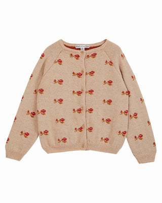Cardigan beige à motif jacquard rouge pour enfant, en maille douce avec fermeture boutonnée.