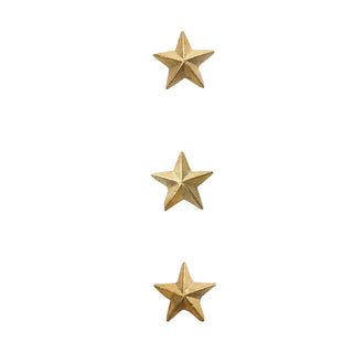 Bijou de Bougie Étoile en métal doré signé Boncoeurs, création artisanale lumineuse et symbolique, pour sublimer vos bougies avec une touche céleste, disponible chez la boutique Coton en Herbe.
