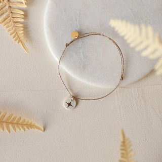 bracelet sur cordon médaillon étoile signé Baubels chez Coton en Herbe