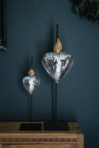 Glorifieur en métal doré signé Boncoeurs, création artisanale inspirée de l’art sacré, symbole de lumière et de dévotion, à découvrir chez la boutique Coton en Herbe.