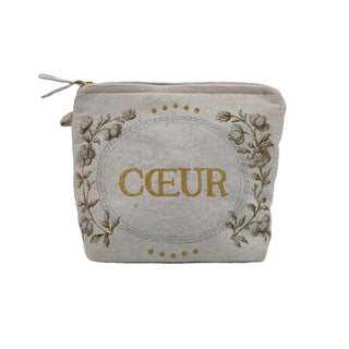 Pochette Enluminure Cœur signée Boncoeurs, création textile artisanale brodée et dorée, symbole d’amour et de lumière, proposée par la boutique Coton en Herbe